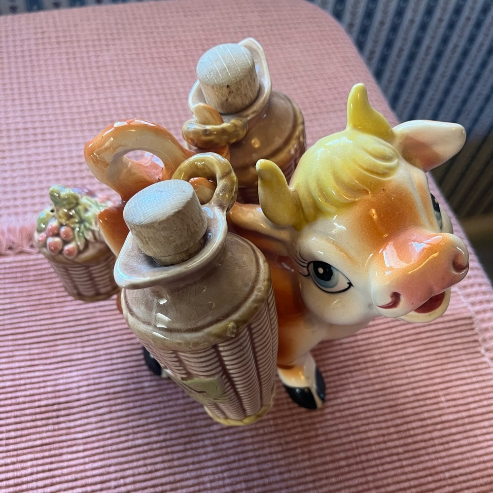 Vintage Portuguese ceramic cow oil and vinegar cruet holder.